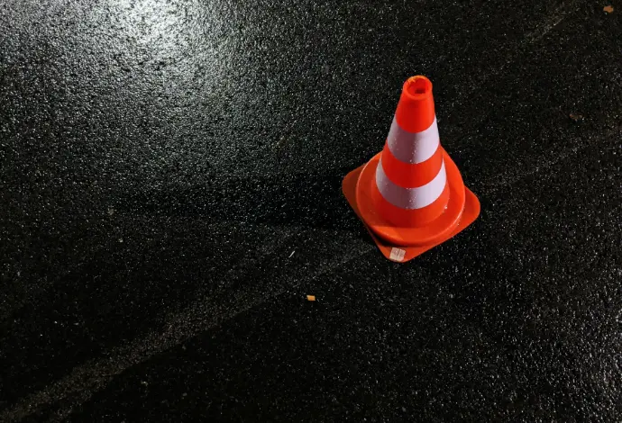 orange and white traffic cone